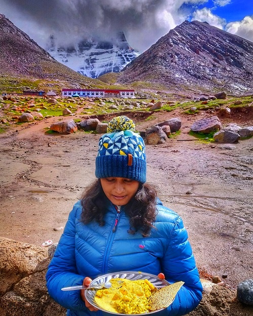 I got served with Sattvic Food during Kailash Mansarovar Yatra. Behind is the North Face of Mount Kailash